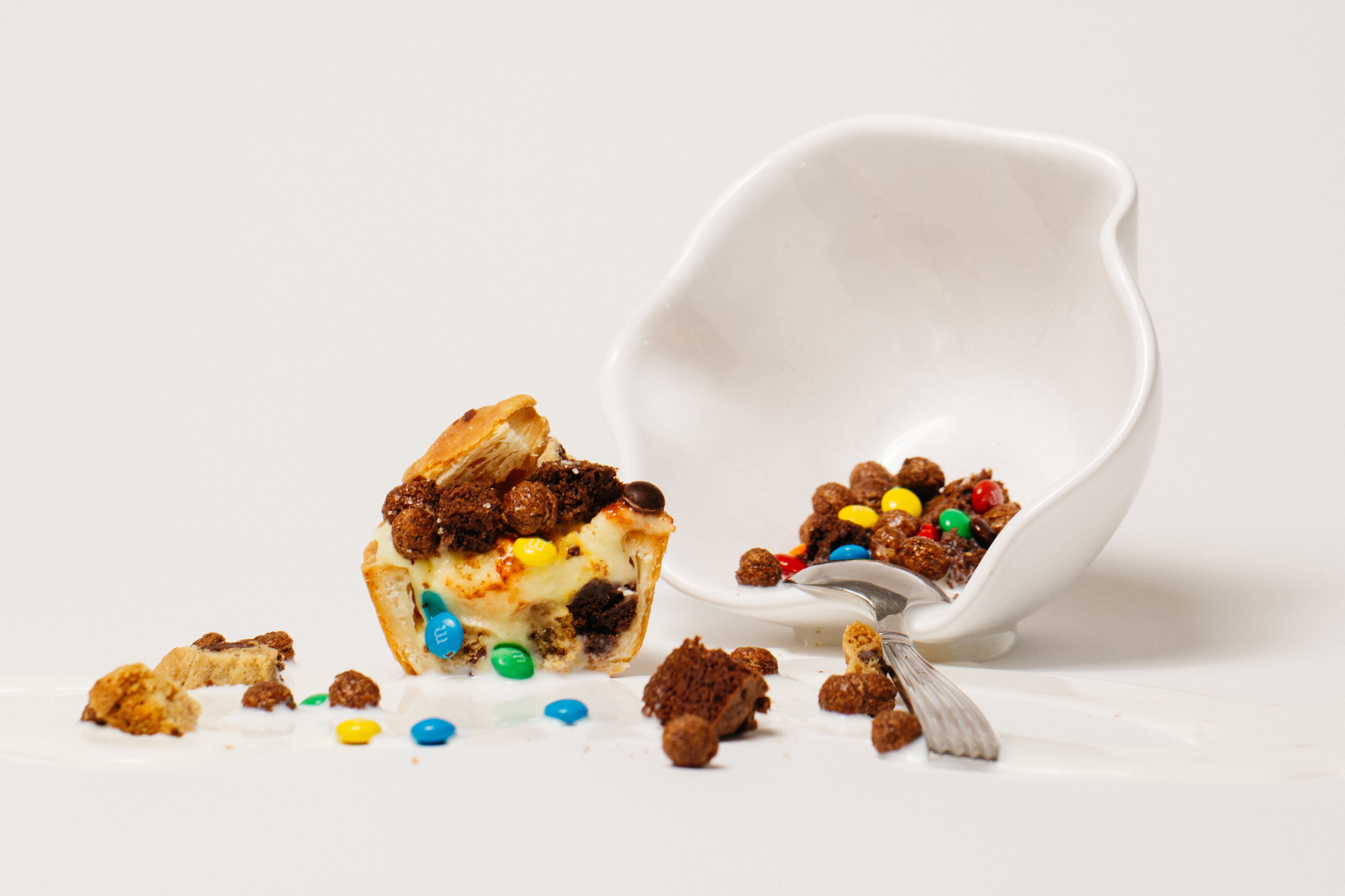 superfluous • \soo-PER-floo-us\ 4/20 Tiny Pies! Vanilla pastry cream with chocolate chip cookie, chewy fudge brownie, cocoa puffs and mini M&Ms and a 4/20 themed Cannabis leaf. (Does NOT contain Cannabis.)
