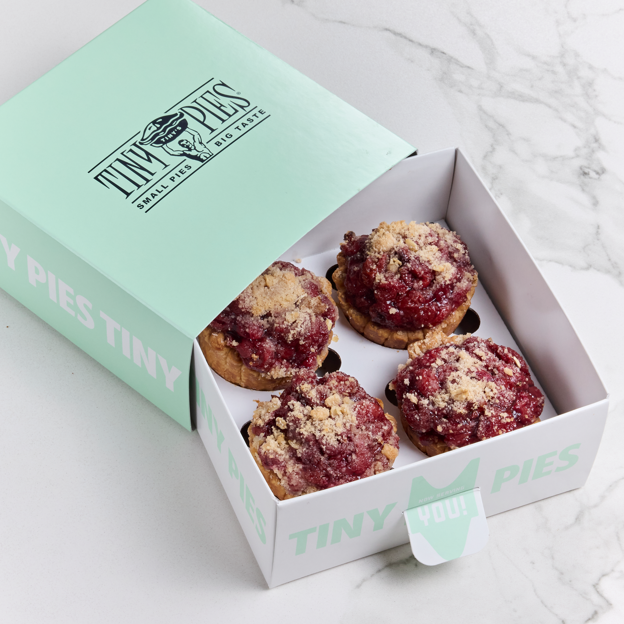 4 cherry crumb mini pies in a mint green gift pack